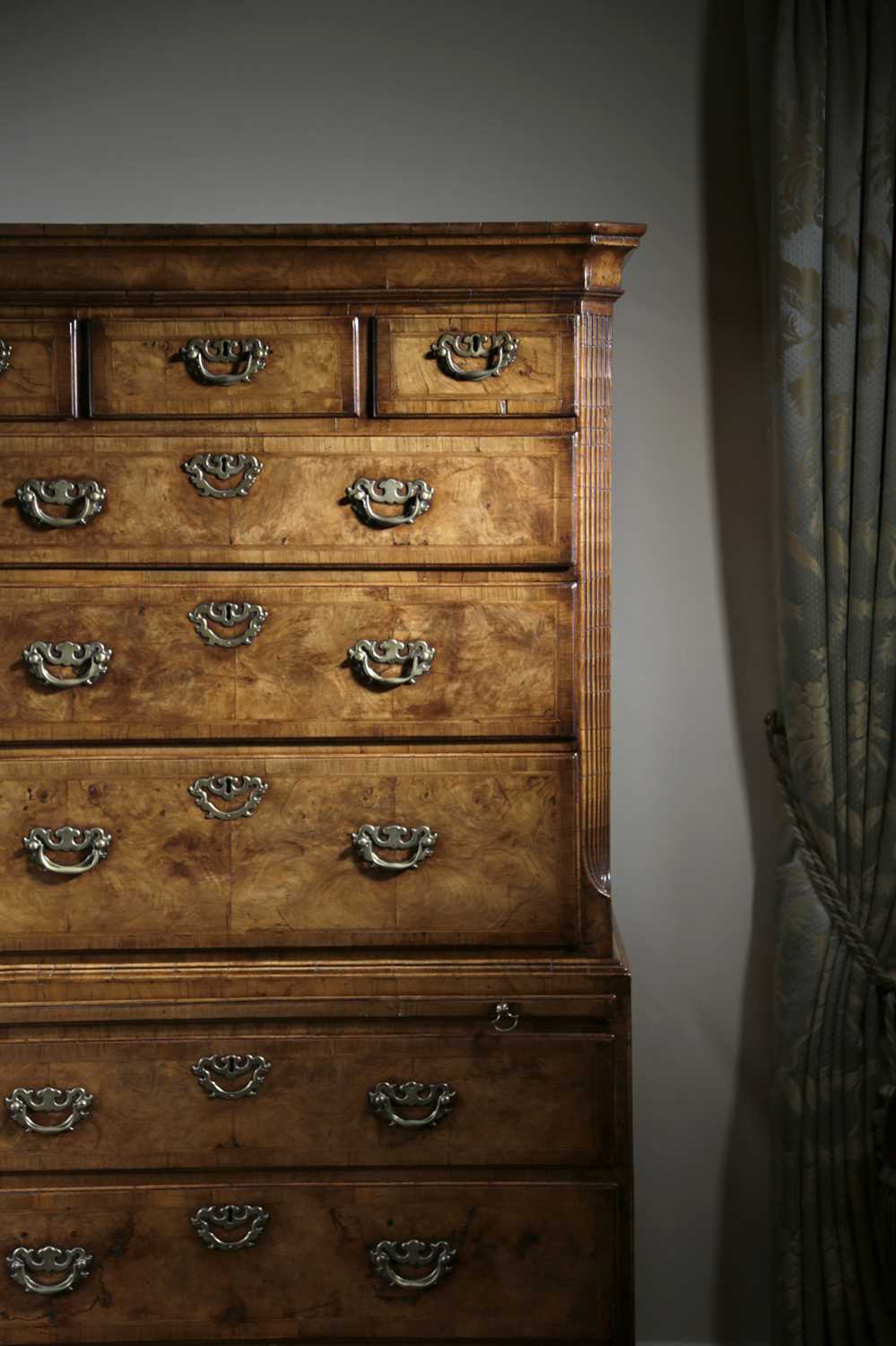 A GEORGE I WALNUT CHEST ON CHEST C.1720 the moulded cornice above three short drawers and three