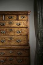 A GEORGE I WALNUT CHEST ON CHEST C.1720 the moulded cornice above three short drawers and three