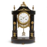 A LOUIS-PHILIPPE ORMOLU AND BLACK MARBLE MANTEL CLOCK BY MALFROY A MACON, EARLY 19TH CENTURY the