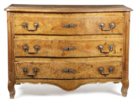 A FRENCH LOUIS XV PROVINCIAL FRUITWOOD SERPENTINE COMMODE MID-18TH CENTURY fitted with three long