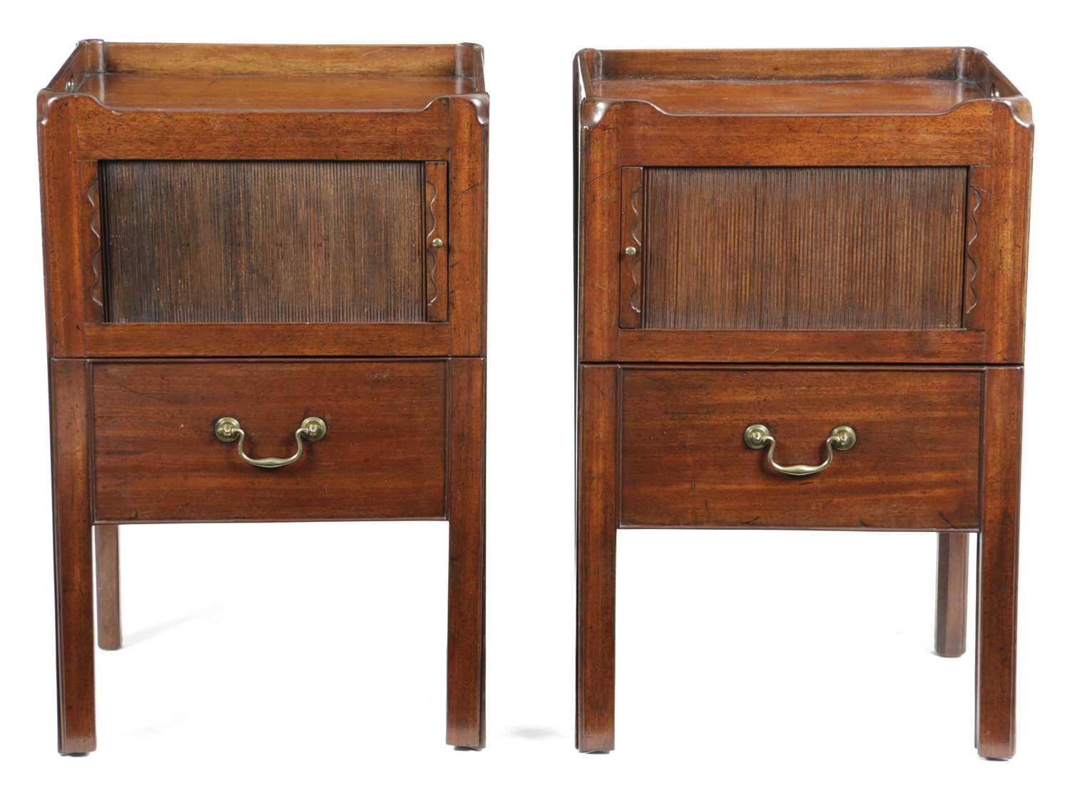 A NEAR PAIR OF GEORGE III MAHOGANY TRAY-TOP BEDSIDE COMMODES SHERATON PERIOD, C.1780-90 each with