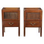 A NEAR PAIR OF GEORGE III MAHOGANY TRAY-TOP BEDSIDE COMMODES SHERATON PERIOD, C.1780-90 each with
