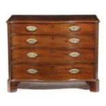 A GEORGE III MAHOGANY SERPENTINE CHEST C.1770-80 with four long drawers flanked by blind fret canted