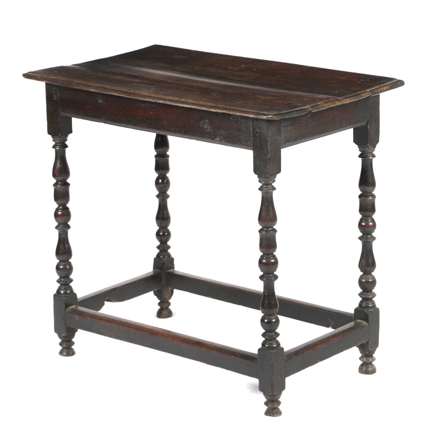 A QUEEN ANNE OAK CENTRE TABLE EARLY 18TH CENTURY with turned baluster cup and cover supports 66.