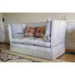 A PAIR OF KNOLE SOFAS BY PAUL HITCHINGS, MODERN each covered in pale blue and yellow silk damask,