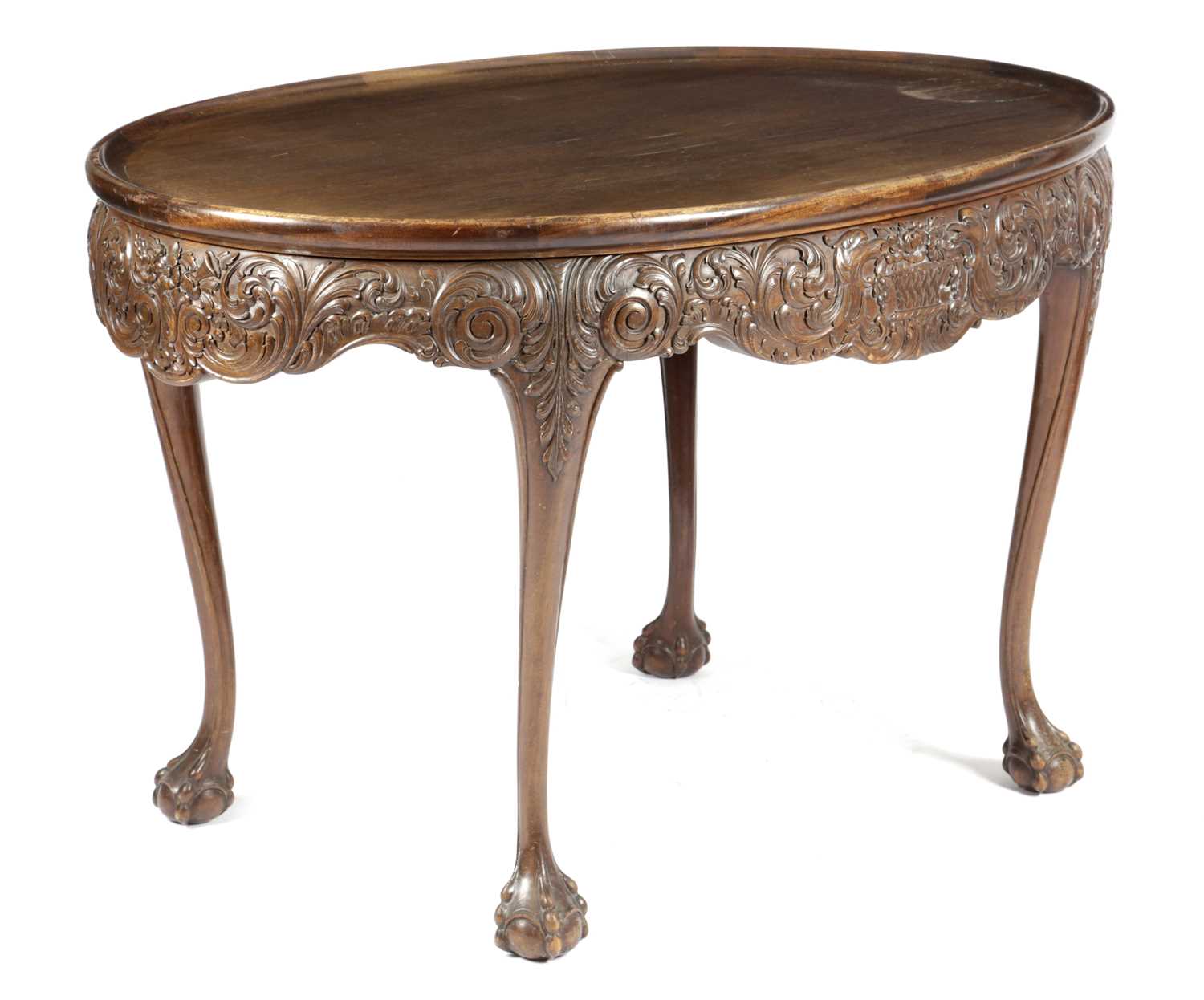 AN IRISH MAHOGANY OVAL SILVER TABLE IN GEORGE II STYLE, EARLY 20TH CENTURY the dished top above a