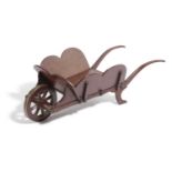 A NOVELTY MAHOGANY MINIATURE WHEELBARROW LATE 19TH / EARLY 20TH CENTURY with brass studs and wheel