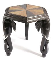 A CEYLONESE EBONY AND SPECIMEN WOOD OCCASIONAL TABLE LATE 19TH CENTURY the hexagonal top with twelve