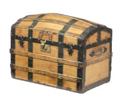 A PINE DOMED TRUNK 19TH CENTURY iron bound, the hinged lid with a compartment to the underside