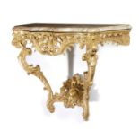 A GEORGE II GILTWOOD CONSOLE TABLE C.1755-60 in the French manner, the pink mottled marble top