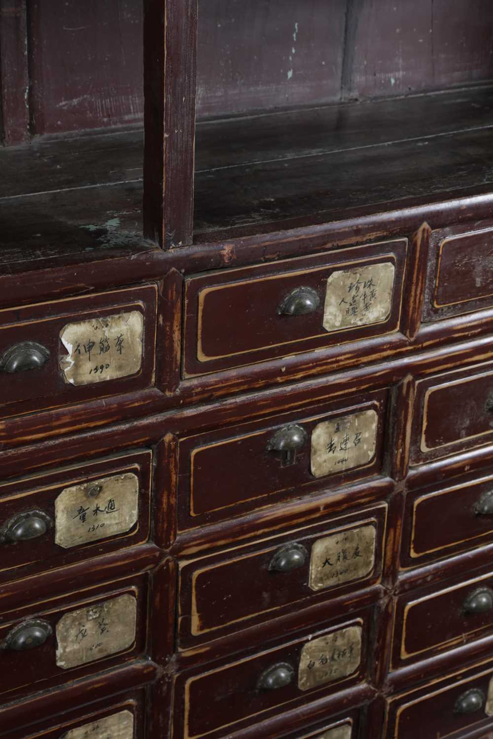 A CHINESE AUBERGINE LACQUER ELM SHOP DISPLAY CABINET LATE 19TH / EARLY 20TH CENTURY the top - Image 2 of 6