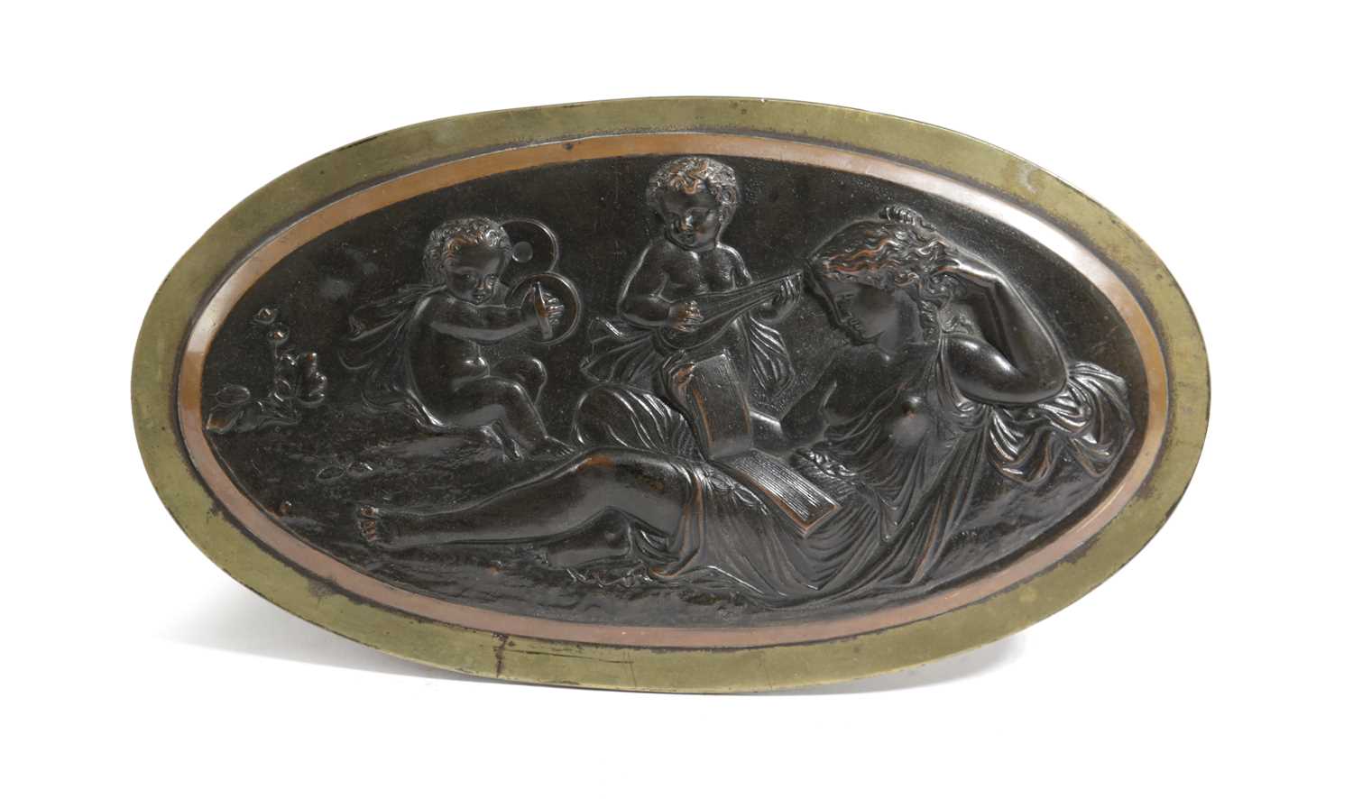 AN ITALIAN BRONZE GRAND TOUR OVAL PLAQUE EARLY 19TH CENTURY depicting a figure emblematic of Music