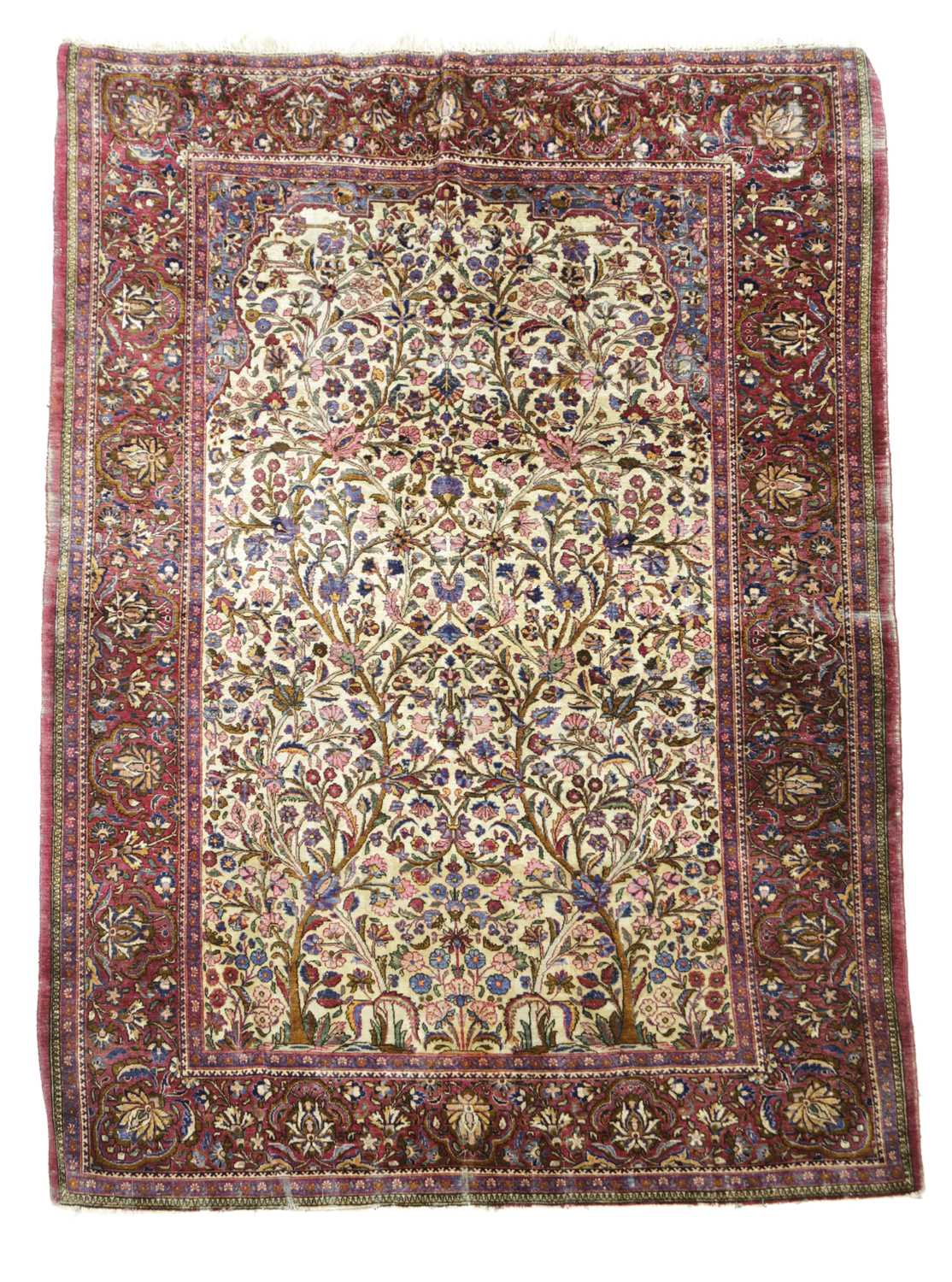 A KASHAN SILK PRAYER RUG C.1930 the ivory field with a tree of life beneath the Mihrab enclosed by