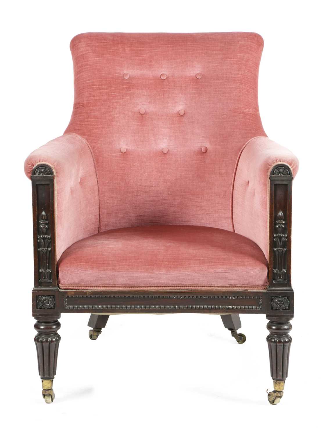 λ A GEORGE IV ROSEWOOD LIBRARY ARMCHAIR IN THE MANNER OF GILLOWS, C.1830 the front carved with