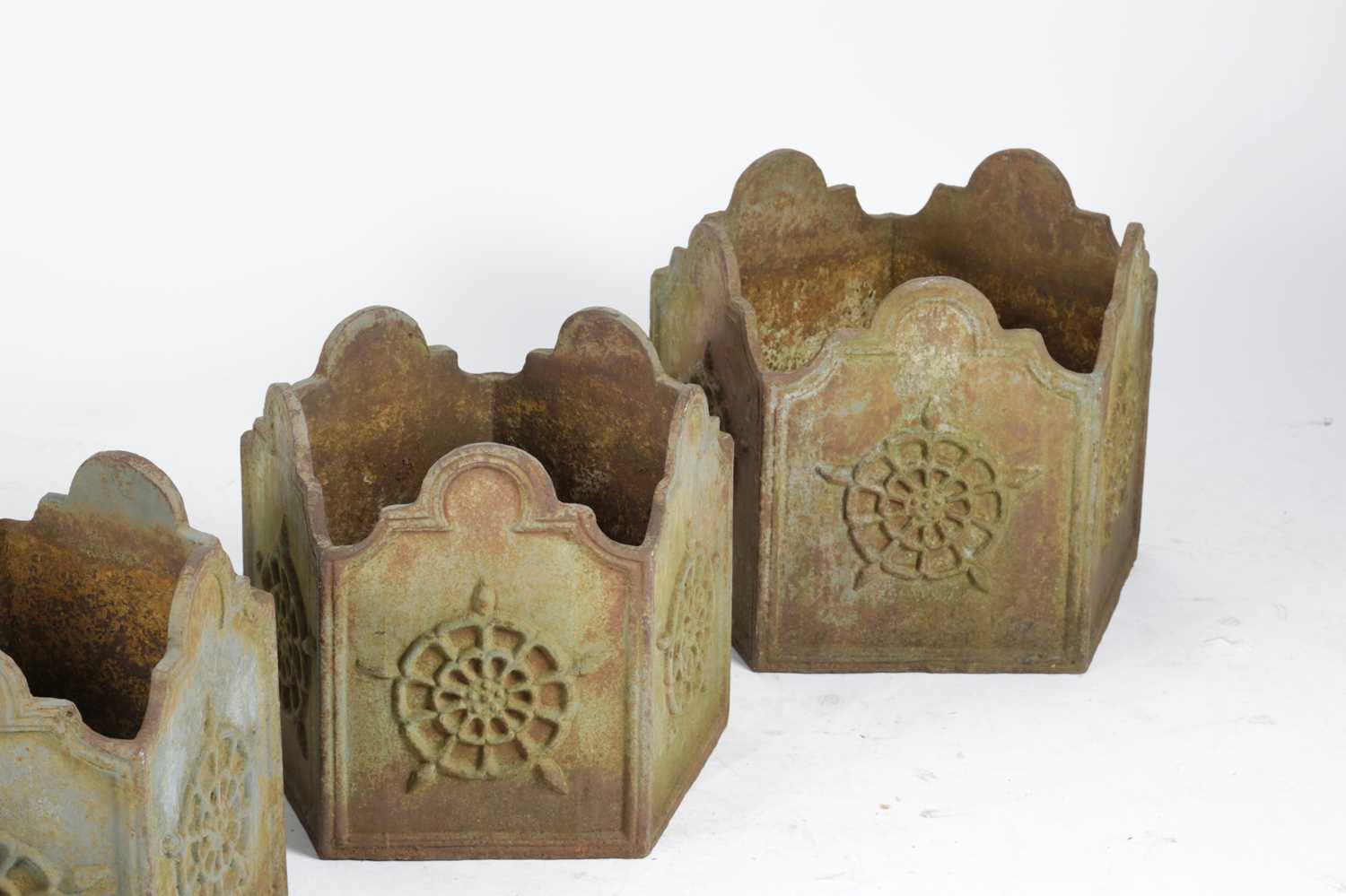 A SET OF FOUR CAST IRON GARDEN URNS EARLY 20TH CENTURY of pentagonal form, each cast with a - Image 2 of 2