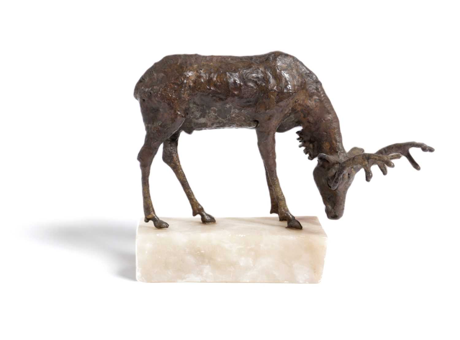 Φ A BRONZE FIGURE OF A GRAZING STAG BY TREVOR FAULKNER, LATE 20TH CENTURY modelled with his head