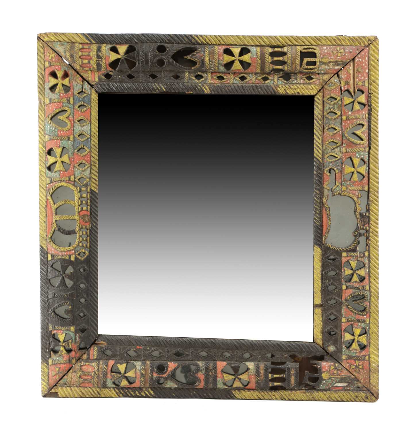 A FOLK ART CARVED AND PAINTED WOOD MIRROR POSSIBLY EASTERN EUROPEAN, 19TH CENTURY the rectangular