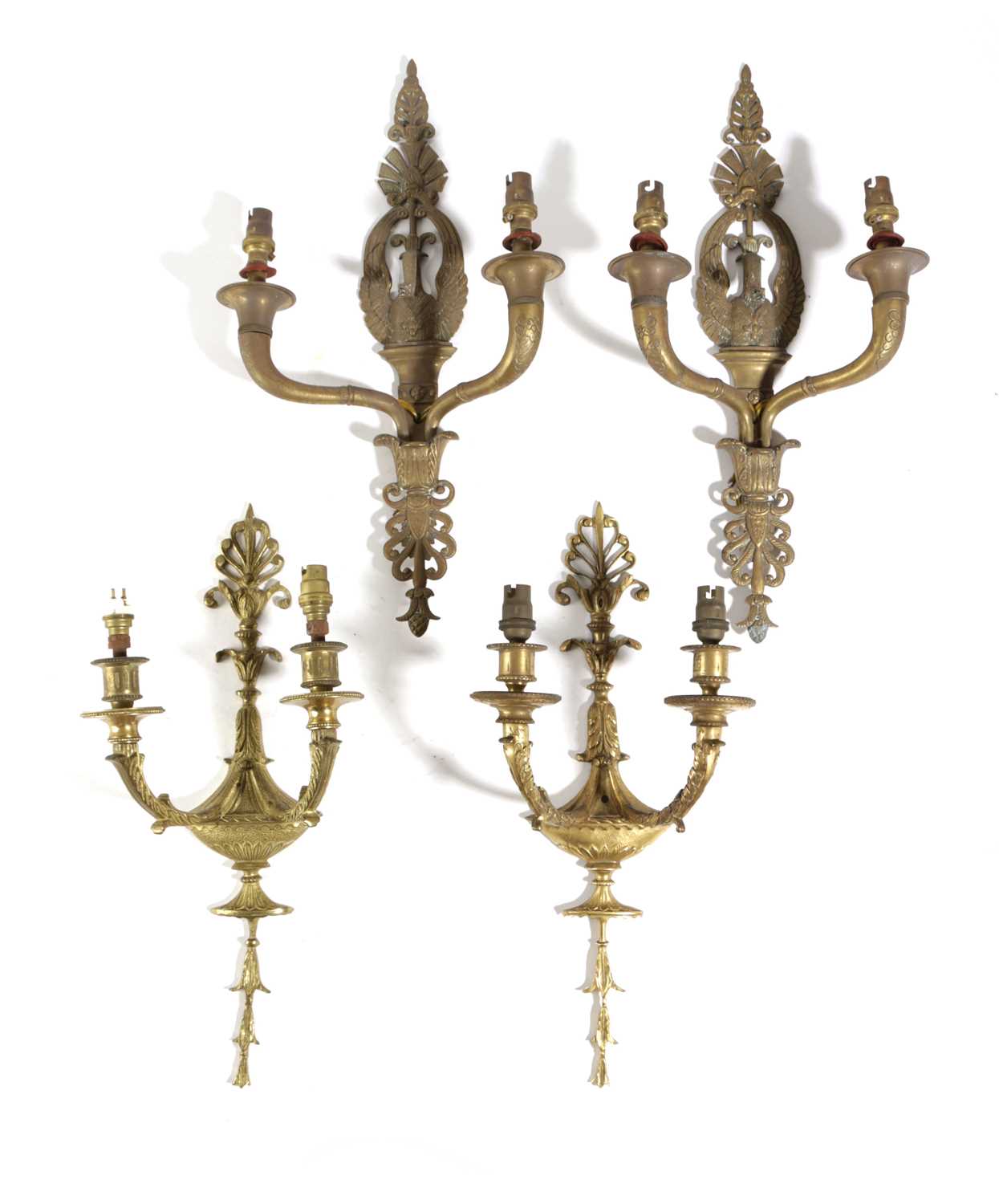 A PAIR OF BRASS WALL LIGHTS IN EMPIRE STYLE, LATE 19TH CENTURY modelled as a swan and acanthus