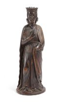 A NORTH EUROPEAN CARVED WALNUT FIGURE OF A FEMALE SAINT LATE 17TH / EARLY 18TH CENTURY modelled