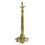 A FRENCH GILT METAL AND GREEN STONEWARE TABLE LAMP LATE 19TH CENTURY the foliate collar above the