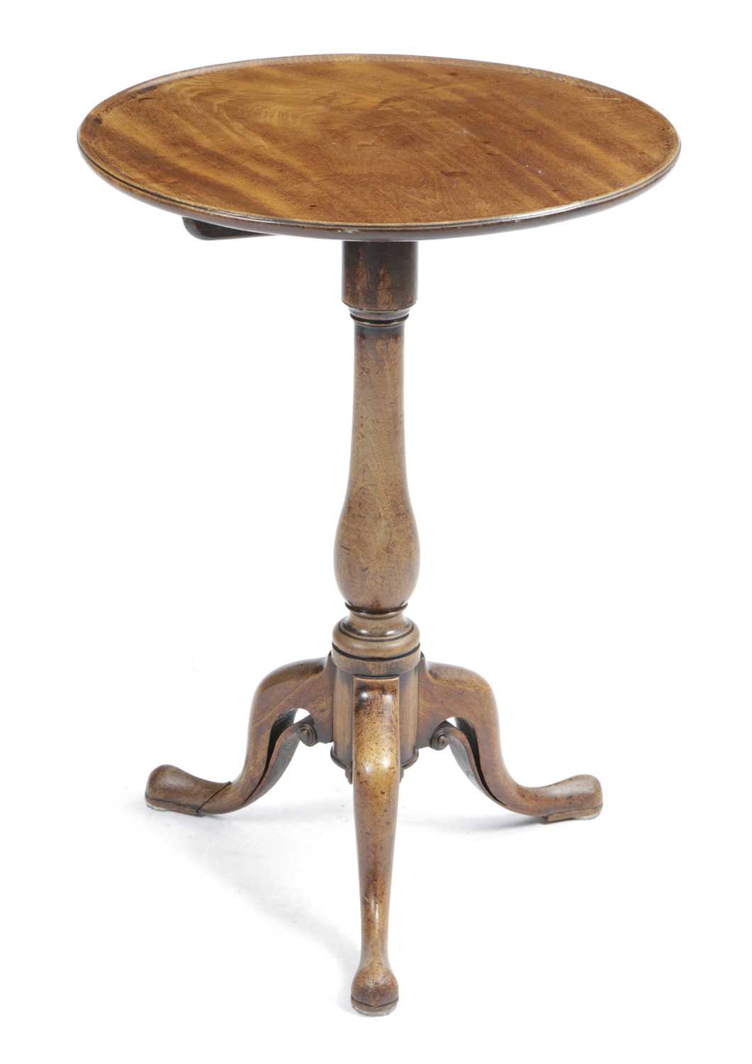 A GEORGE III MAHOGANY TRIPOD TABLE C.1770 the circular dished tilt-top on a baluster column and
