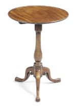 A GEORGE III MAHOGANY TRIPOD TABLE C.1770 the circular dished tilt-top on a baluster column and