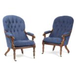 A PAIR OF EARLY VICTORIAN MAHOGANY ARMCHAIRS C.1850 each button upholstered and on turned front legs