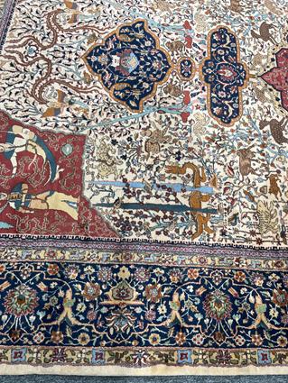 AN UNUSUAL INDIAN CARPET C.1960 the ivory field with trees, vines and mythological animals around - Image 18 of 18