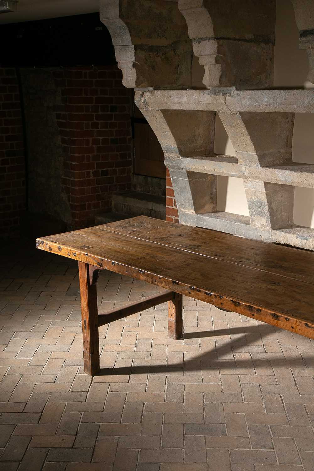 AN ELM REFECTORY TABLE 19TH CENTURY, INCORPORATING EARLIER WOODS the cleated two plank top on square
