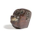 A TREEN MONKEY'S HEAD SNUFF BOX LATE 18TH / EARLY 19TH CENTURY with glass eyes and bone teeth,