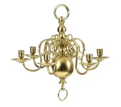 A SMALL DUTCH BRASS SIX-LIGHT CHANDELIER 18TH CENTURY with a turned stem and detachable scroll