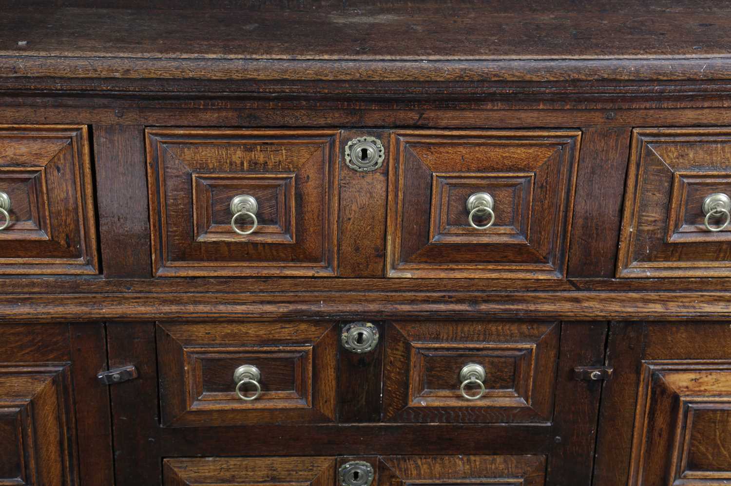 A CHARLES II OAK DRESSER LATE 17TH CENTURY the top with a moulded edge above a 'T' arrangement of - Image 2 of 3