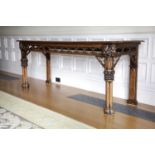 A FINE GEORGE IV OAK GOTHIC REVIVAL SERVING TABLE IN THE MANNER OF A.W.N. PUGIN, C.1830 the frieze