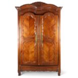 A FRENCH PROVINCIAL CHERRYWOOD ARMOIRE BY CHARLES ALLORY (1783-1853), RENNES, BRITANNY, EARLY 19TH