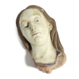 AN ITALIAN COLD PAINTED TERRACOTTA HEAD OF THE VIRGIN MARY DECORATED IN DELLA ROBBIA STYLE, PROBABLY