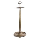 A BRASS COUNTRY HOUSE STICKSTAND LATE 19TH CENTURY with a hoop handle above three oval divisions,