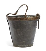 A GEORGE III LEATHER FIRE BUCKET LATE 18TH CENTURY with a strap handle, copper rim and brass studs