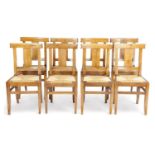 A SET OF EIGHT ITALIAN WALNUT DINING CHAIRS EARLY 19TH CENTURY each with a bar back above a tablet