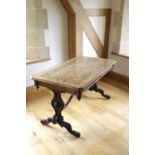 AN EARLY VICTORIAN WALNUT AND MARQUETRY LIBRARY TABLE C.1840-50 the canted rectangular top with a