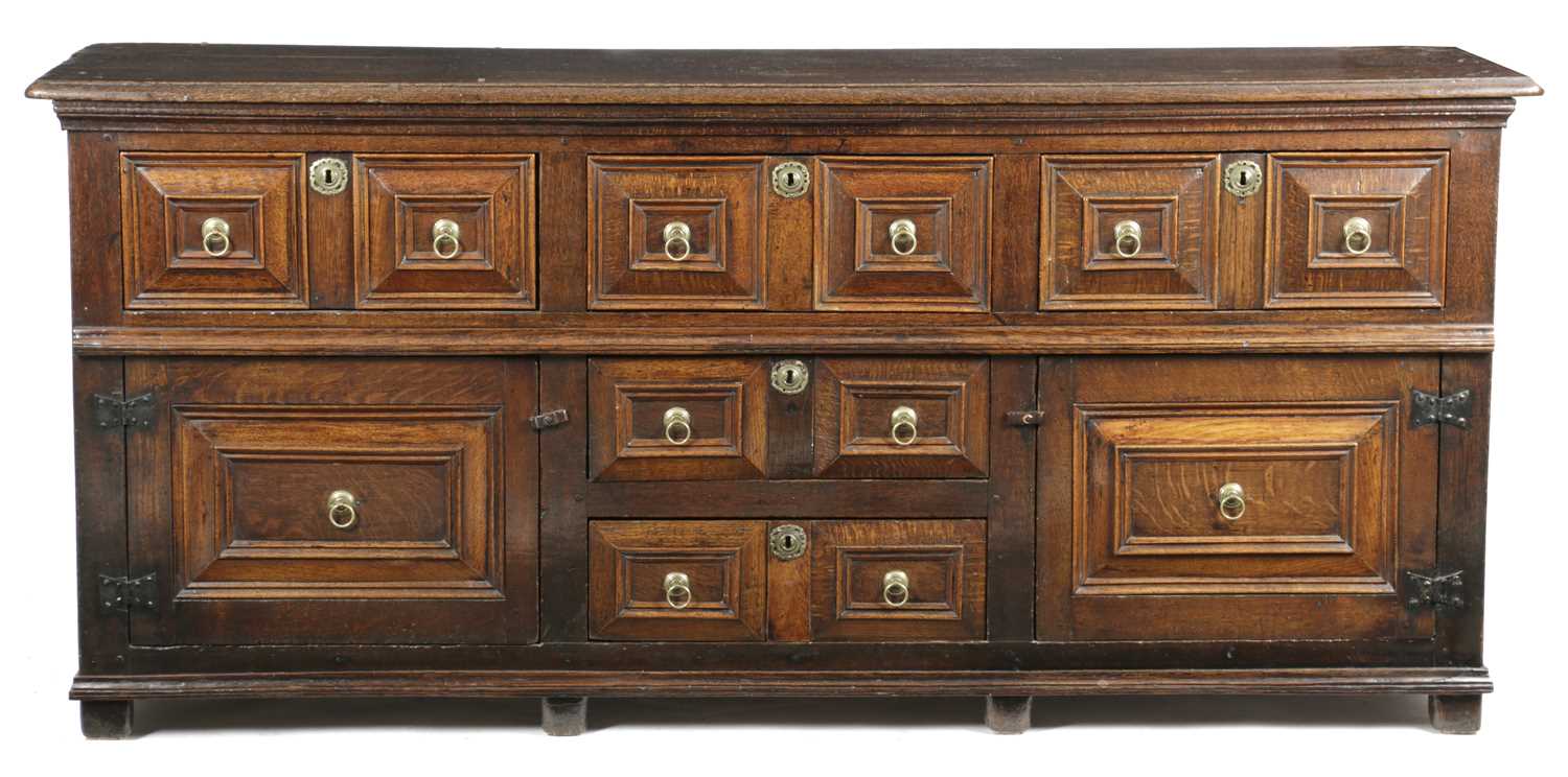 A CHARLES II OAK DRESSER LATE 17TH CENTURY the top with a moulded edge above a 'T' arrangement of