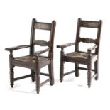 A PAIR OF FOLK ART MINIATURE ARMCHAIRS 19TH CENTURY each with bar back, outswept arms and rush seat,