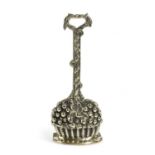 A VICTORIAN BRASS DOORSTOP LATE 19TH CENTURY cast as a basket of fruit beneath a foliate handle 36.