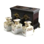 A FRENCH EBONY AND INLAID TEA CHEST C.1850 the hinged cover with brass and mother of pearl inlaid