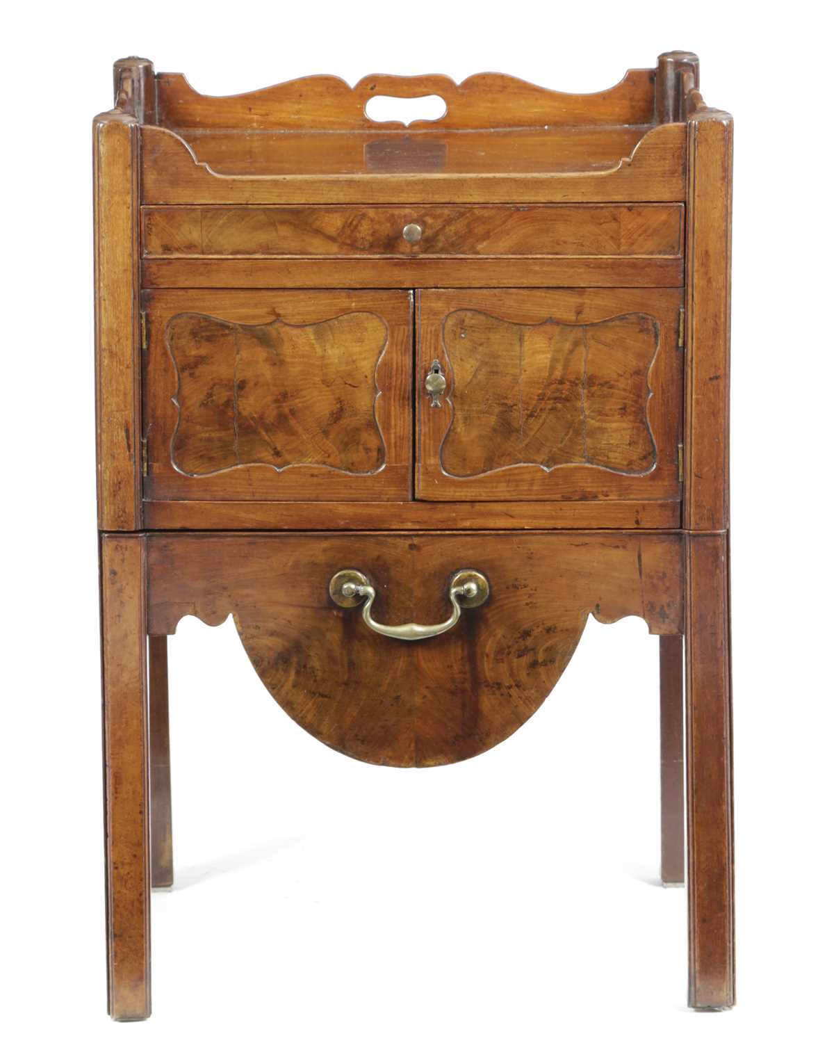 A GEORGE III MAHOGANY TRAY-TOP BEDSIDE COMMODE C.1780 pierced with a scrolling gallery above a