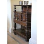 AN ELIZABETH I OAK THREE TIER BUFFET LATE 16TH CENTURY AND LATER the upper shelf with a carved