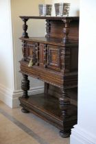 AN ELIZABETH I OAK THREE TIER BUFFET LATE 16TH CENTURY AND LATER the upper shelf with a carved