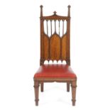 A GEORGE IV OAK GOTHIC REVIVAL CHAIR BY JOHN KENDELL & CO, LEEDS (FL. 1783-1863), C.1825-30 with a