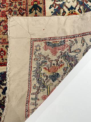 A SENNEH CARPET PERSIAN KURDISTAN, C.1900 the pale camel Herati field enclosed by ivory flowerhead - Image 3 of 20