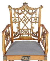 A FINE PAINTED SATINWOOD ARMCHAIR IN GEORGE III CHINESE CHIPPENDALE STYLE, ATTRIBUTED TO S.