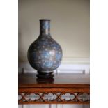 A JAPANESE SATSUMA POTTERY BOTTLE VASE MEIJI PERIOD, LATE 19TH / EARLY 20TH CENTURY enamelled with